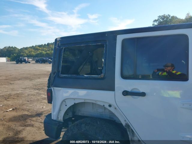 1C4HJWDG8EL113209 Jeep Wrangler Unlimited Sport
