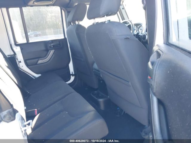 1C4HJWDG8EL113209 Jeep Wrangler Unlimited Sport