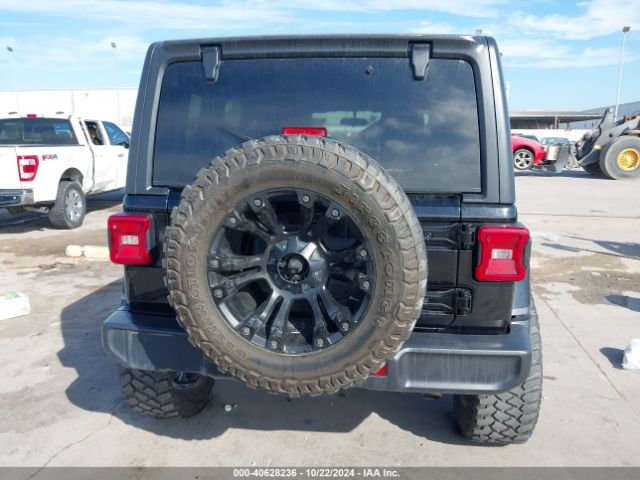 1C4HJXEG5JW139148 Jeep Wrangler Unlimited Sahara 4x4