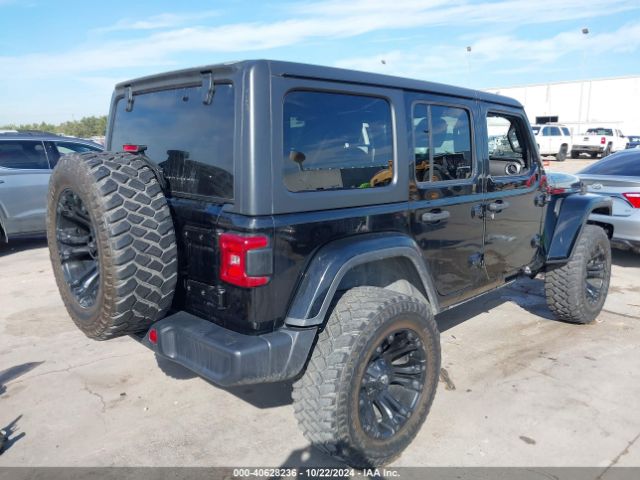 1C4HJXEG5JW139148 Jeep Wrangler Unlimited Sahara 4x4
