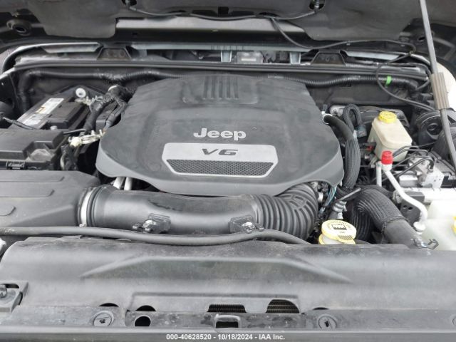 1C4BJWEG4EL317865 Jeep Wrangler Unlimited Sahara