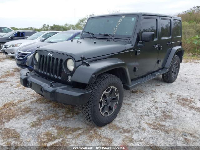 1C4BJWEG4EL317865 Jeep Wrangler Unlimited Sahara