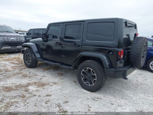 1C4BJWEG4EL317865 Jeep Wrangler Unlimited Sahara