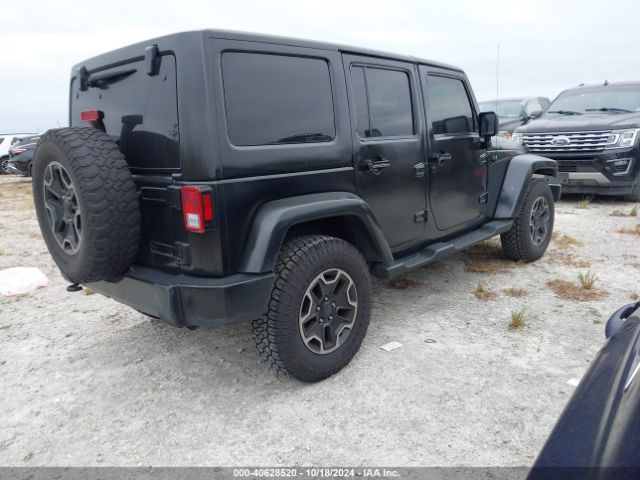 1C4BJWEG4EL317865 Jeep Wrangler Unlimited Sahara