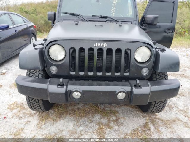 1C4BJWEG4EL317865 Jeep Wrangler Unlimited Sahara
