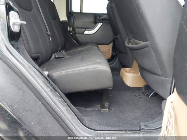 1C4BJWEG4EL317865 Jeep Wrangler Unlimited Sahara