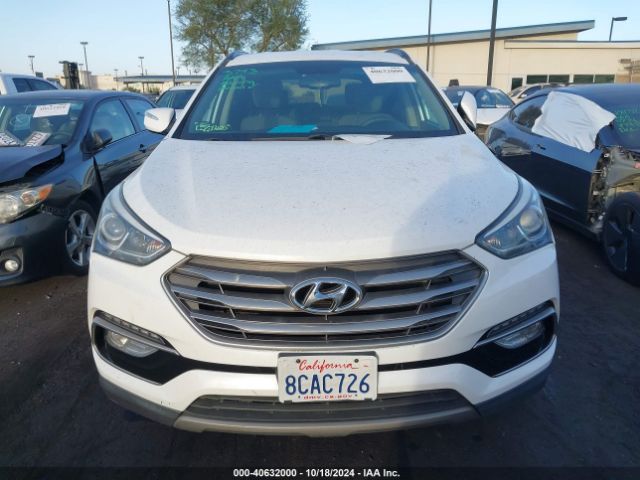 5NMZU3LB0JH061649 Hyundai Santa Fe Sport 2.4l