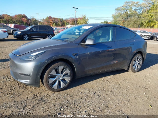 2023 TESLA MODEL Y 7SAYGDEE7PF880560 Photo 1