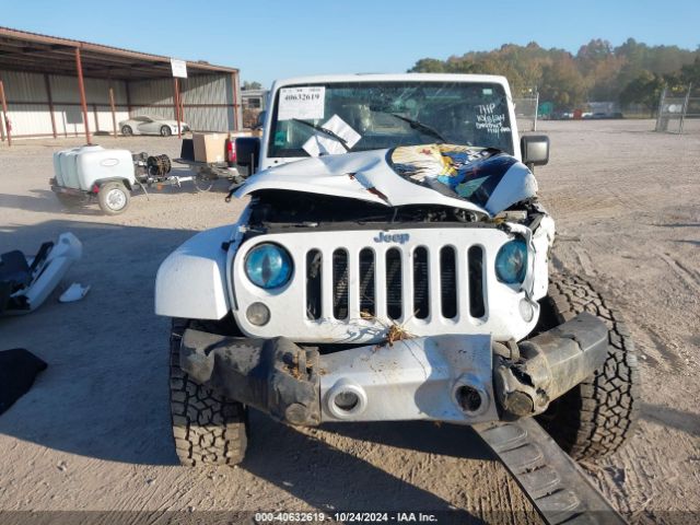 1C4HJWEG9EL224205 Jeep Wrangler Unlimited Sahara
