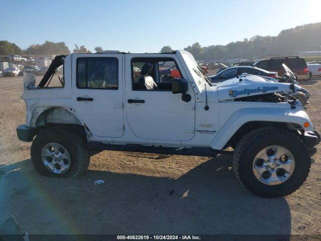 1C4HJWEG9EL224205 Jeep Wrangler Unlimited Sahara