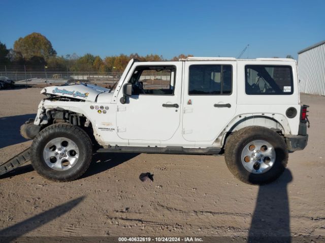 1C4HJWEG9EL224205 Jeep Wrangler Unlimited Sahara