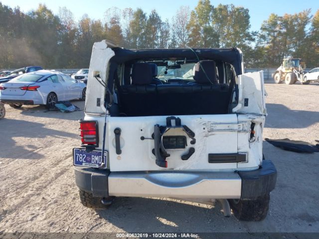 1C4HJWEG9EL224205 Jeep Wrangler Unlimited Sahara