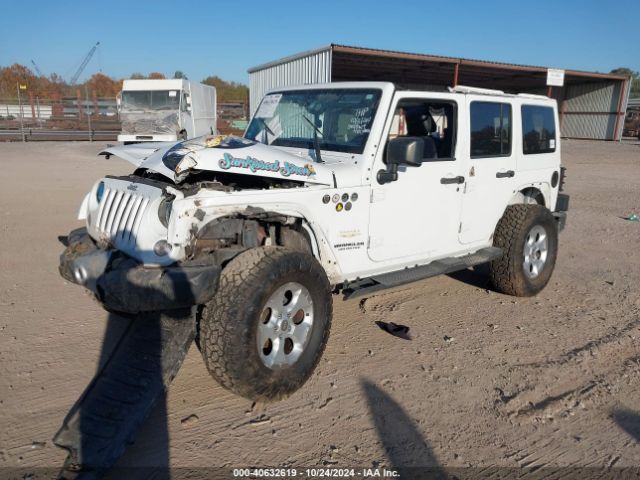 1C4HJWEG9EL224205 Jeep Wrangler Unlimited Sahara