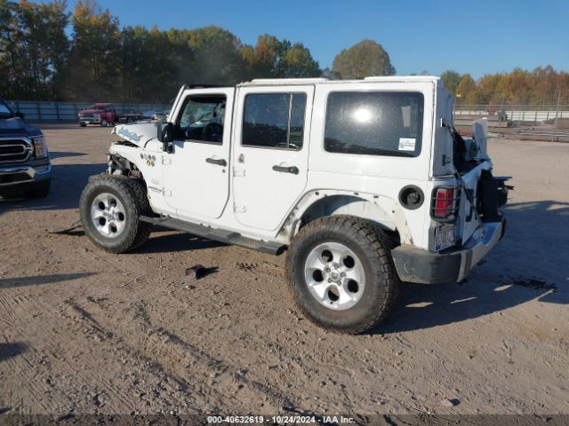1C4HJWEG9EL224205 Jeep Wrangler Unlimited Sahara