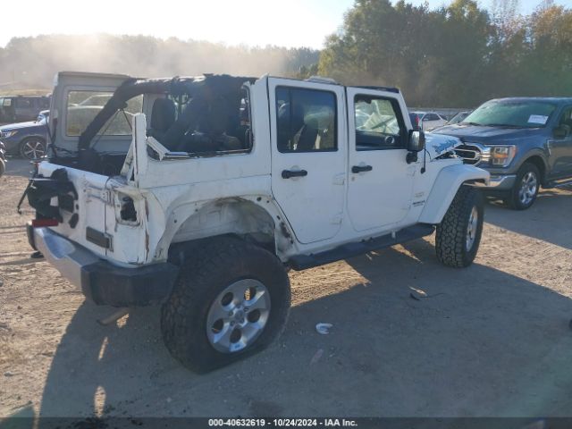 1C4HJWEG9EL224205 Jeep Wrangler Unlimited Sahara