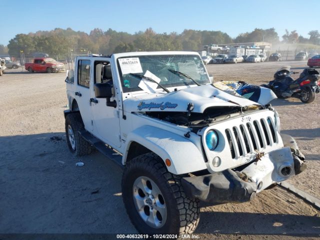 1C4HJWEG9EL224205 Jeep Wrangler Unlimited Sahara