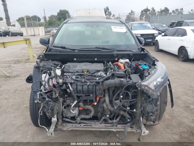 JTMLWRFV2KD002749 Toyota Rav4 Hybrid Le