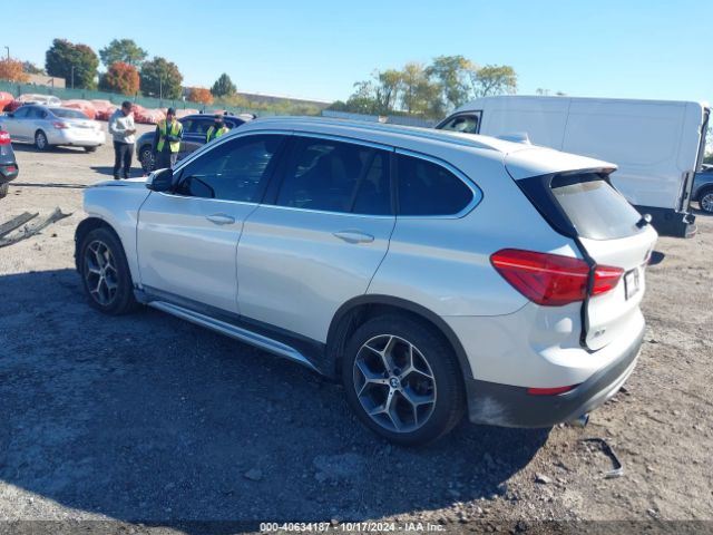 2019 BMW X1 WBXHT3C53K5L89891 Photo 2