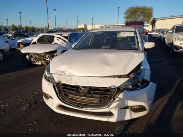 3MZBN1V31JM203137 Mazda Mazda3 Touring