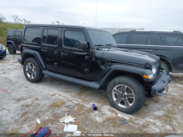 1C4HJXEN5JW232458 Jeep Wrangler Unlimited Sahara 4x4