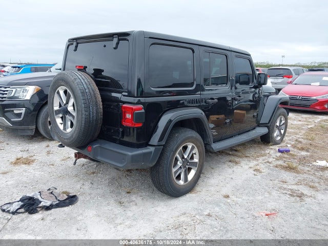 1C4HJXEN5JW232458 Jeep Wrangler Unlimited Sahara 4x4