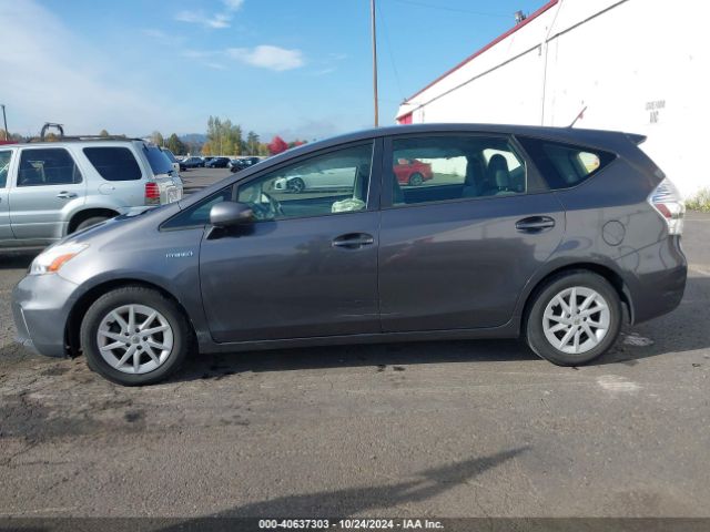 JTDZN3EUXEJ011451 Toyota Prius V Three
