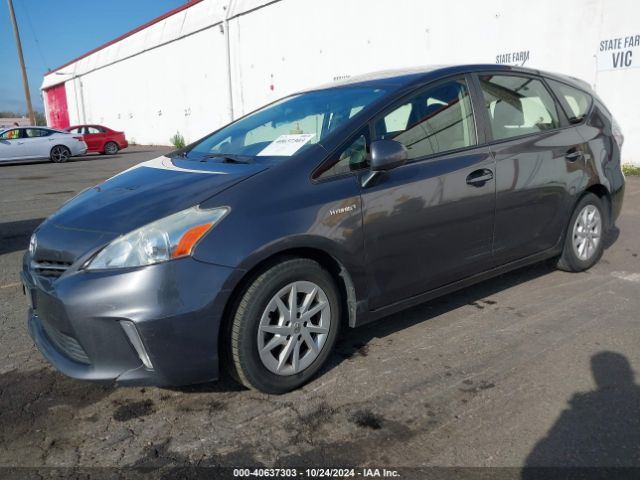 JTDZN3EUXEJ011451 Toyota Prius V Three
