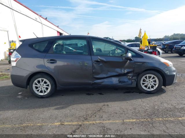 JTDZN3EUXEJ011451 Toyota Prius V Three