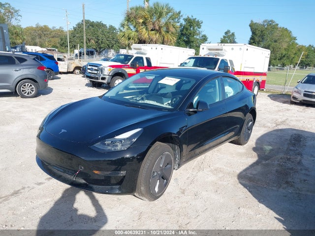 2023 TESLA MODEL 3 5YJ3E1EB2PF389329 Photo 1