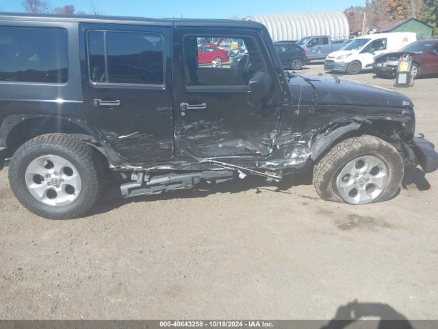 1C4BJWEG5FL704345 Jeep Wrangler Unlimited Sahara