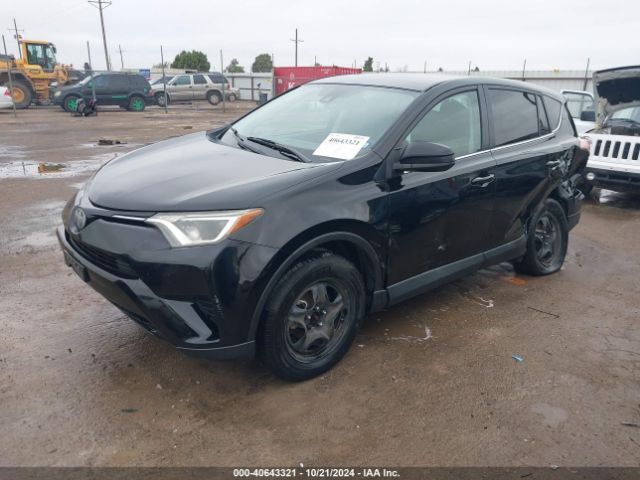 2T3ZFREV9JW456087 Toyota RAV4 LE