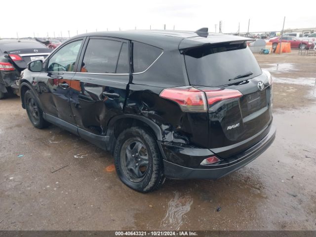 2T3ZFREV9JW456087 Toyota RAV4 LE