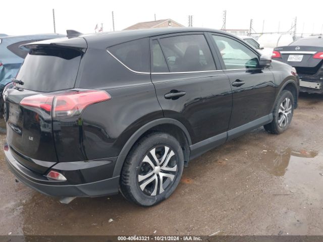 2T3ZFREV9JW456087 Toyota RAV4 LE