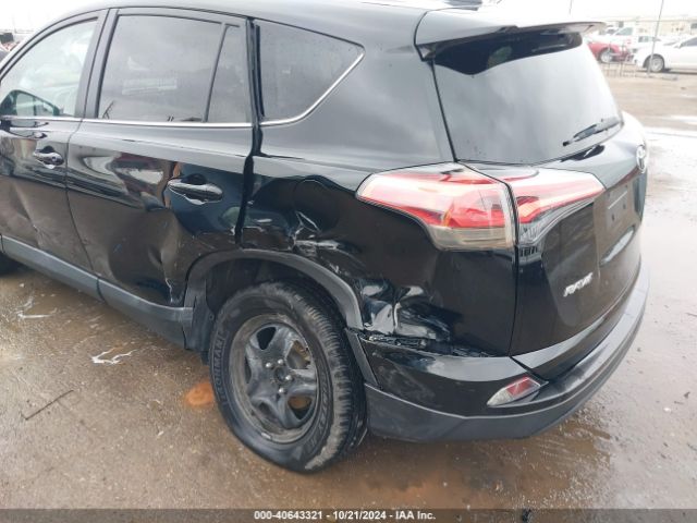 2T3ZFREV9JW456087 Toyota RAV4 LE