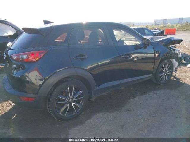 JM1DKDC72J0304623 Mazda Cx-3 Touring