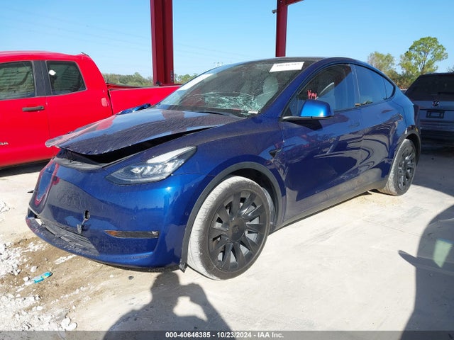 2021 TESLA MODEL Y 5YJYGAEE2MF293562 Photo 1