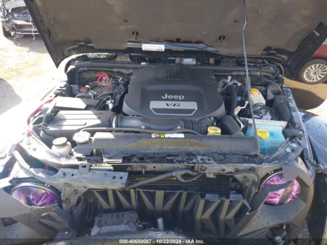 1C4BJWEG9FL713162 Jeep Wrangler Unlimited Sahara