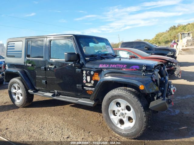 1C4BJWEG9FL713162 Jeep Wrangler Unlimited Sahara
