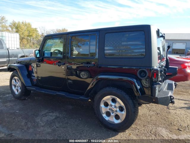 1C4BJWEG9FL713162 Jeep Wrangler Unlimited Sahara