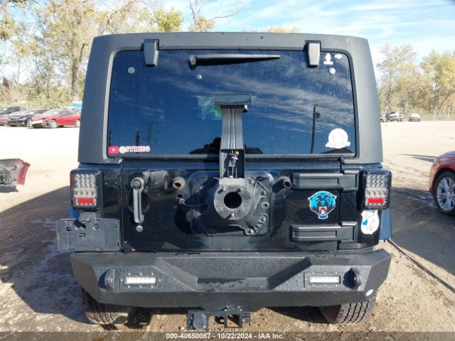1C4BJWEG9FL713162 Jeep Wrangler Unlimited Sahara