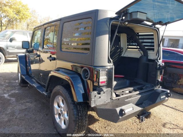 1C4BJWEG9FL713162 Jeep Wrangler Unlimited Sahara