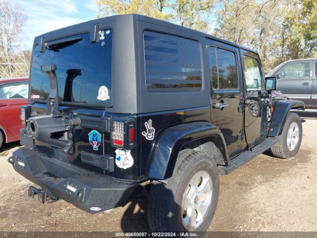 1C4BJWEG9FL713162 Jeep Wrangler Unlimited Sahara