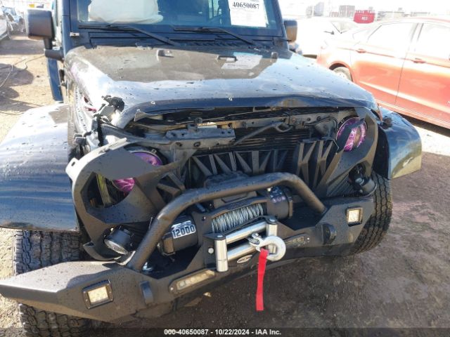 1C4BJWEG9FL713162 Jeep Wrangler Unlimited Sahara