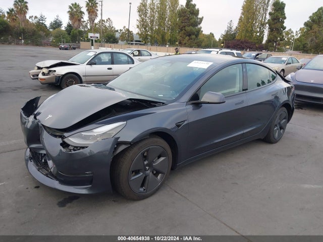 2023 TESLA MODEL 3 5YJ3E1EA2PF711989 Photo 1