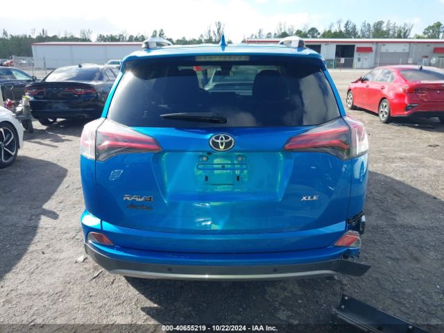 JTMWFREVXJJ164935 Toyota Rav4 Adventure/xle