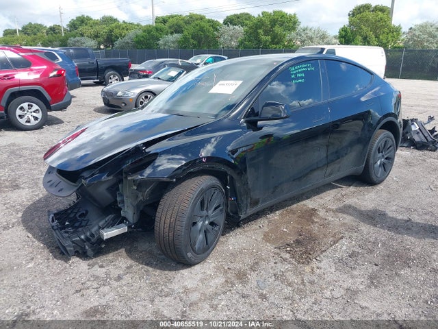 2024 TESLA MODEL Y 7SAYGDEEXRA308320 Photo 1