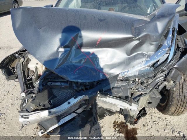 NMTKHMBX2LR105559 Toyota C-HR LE