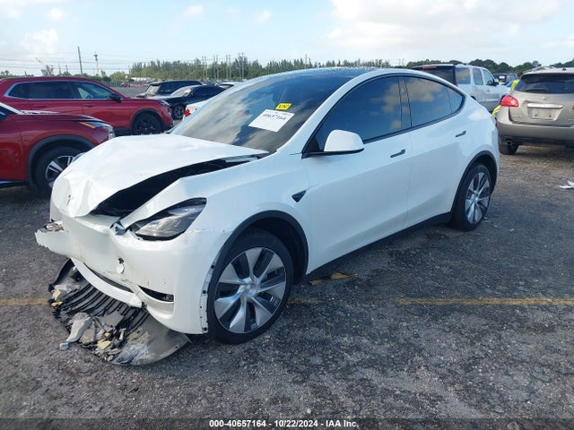 2023 TESLA MODEL Y 7SAYGDED1PF957284 Photo 1