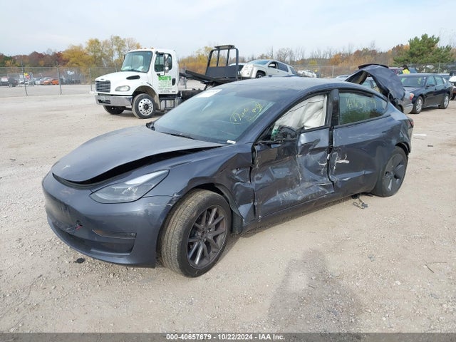 2023 TESLA MODEL 3 5YJ3E1EB9PF634742 Photo 1