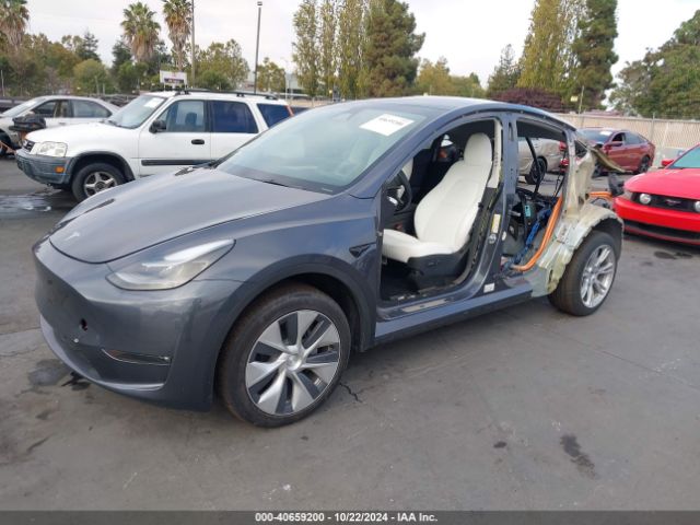 2023 TESLA MODEL Y 7SAYGDEEXPF878303 Photo 1